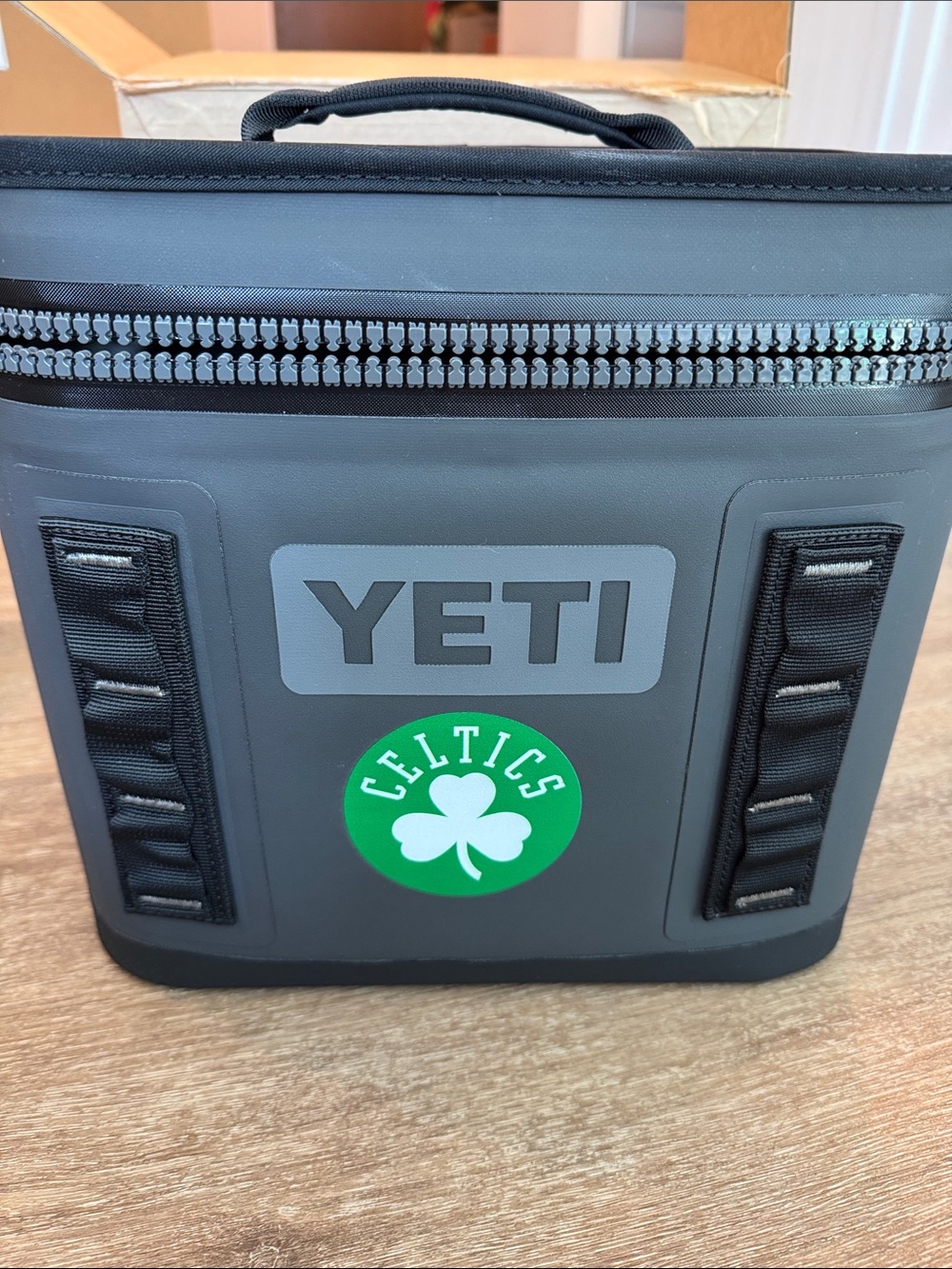 New never used Yeti Hopper Flip in Charcoal with Celtics label on front